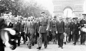 Liberation of Paris: General Charles de Gaulle and his entourage set off from the Arc de Triumphe down the Champs Elysees to Notre Dame for a service of thanksgiving following the city's liberation in August 1944.