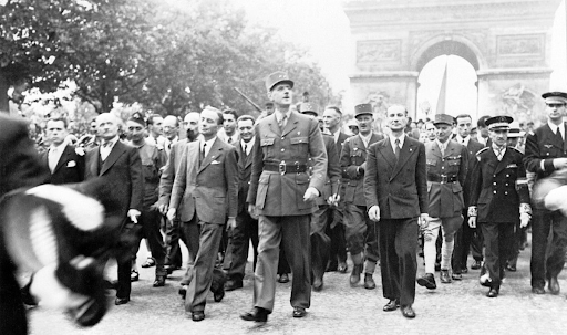 Liberation of Paris: General Charles de Gaulle and his entourage set off from the Arc de Triumphe down the Champs Elysees to Notre Dame for a service of thanksgiving following the city's liberation in August 1944.